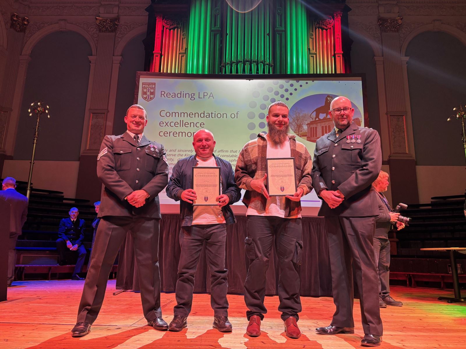 Reading BID business wardens on stage receiving commendation from Thames Valley Police